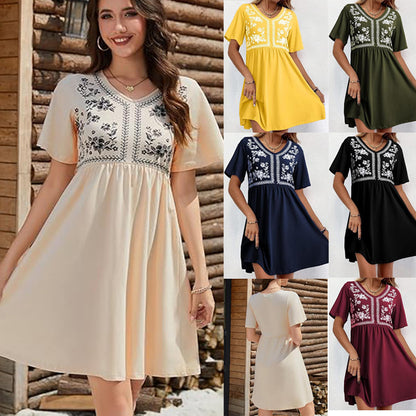 Robe décontractée pour femme à col en V, imprimée, manches courtes, taille marquée et coupe ample.