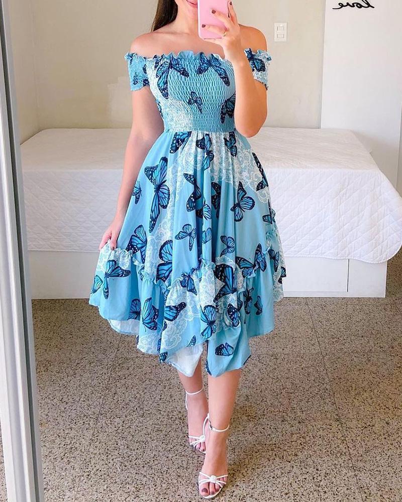Robe épaules dénudées à coupe irrégulière avec impression numérique.