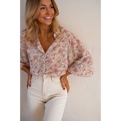 Chemise tendance pour femme à rangée unique de boutons multiples.